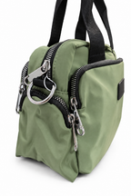 Bolso verde, vista trasera